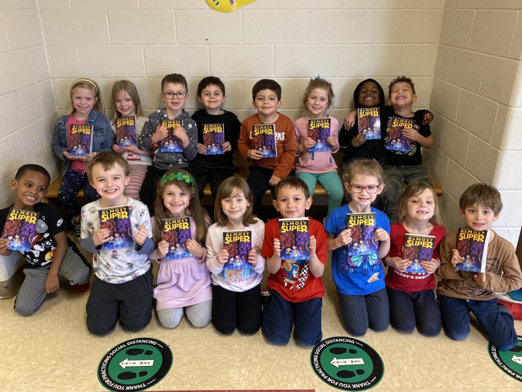 Nordonia elementary students holding their One School One Book copies